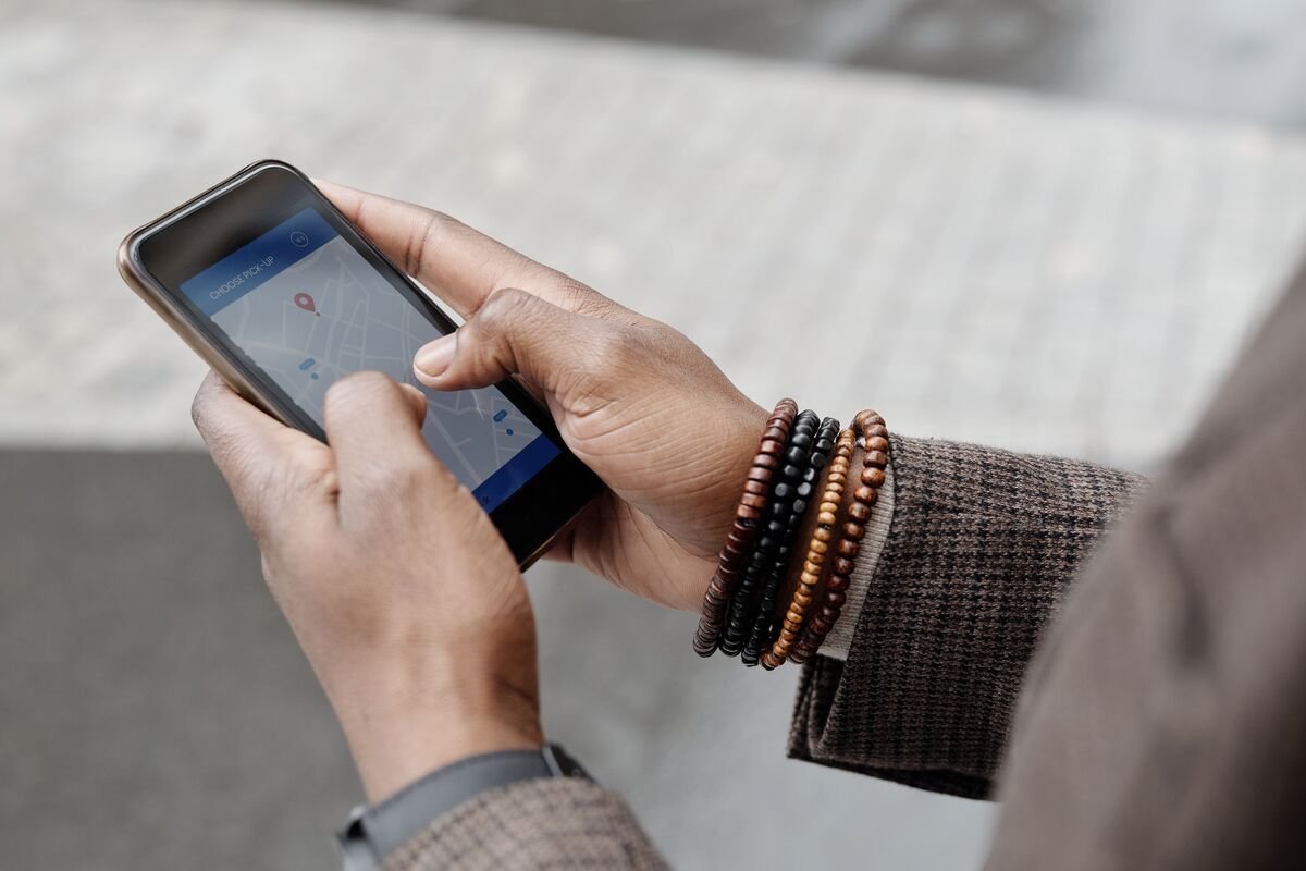 hands holding a smartphone showing a map, what is local seo