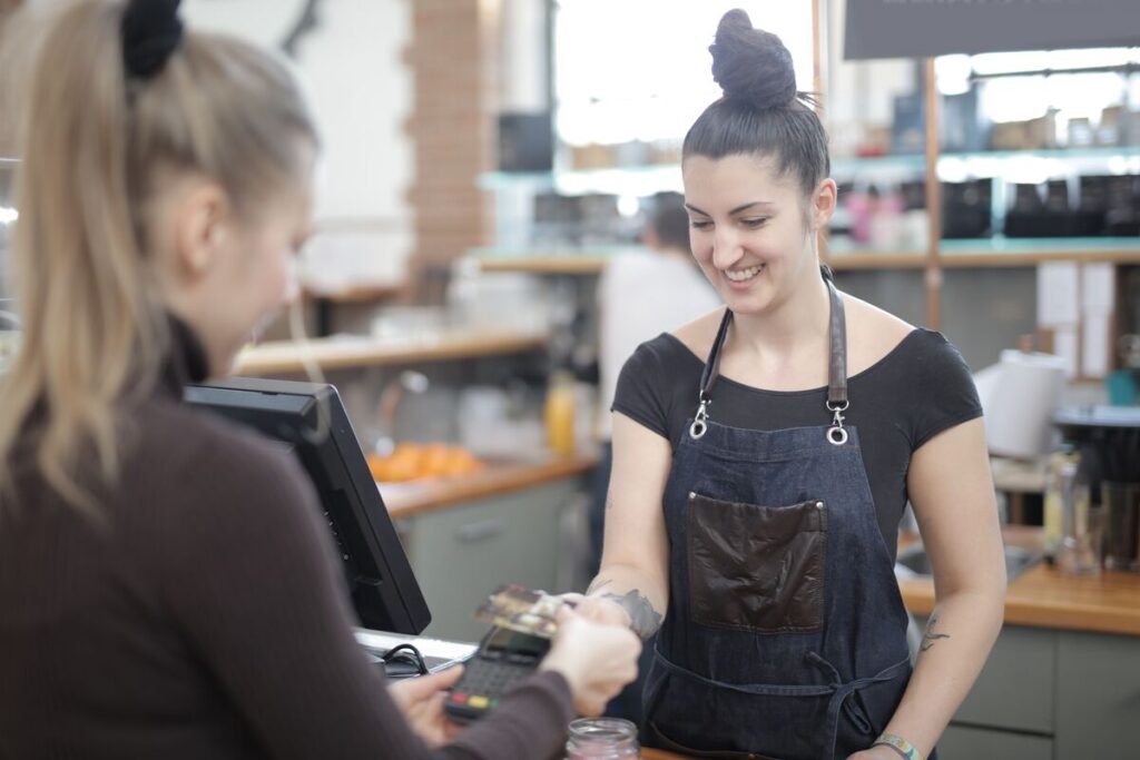 customer paying at a cafe, what is local seo