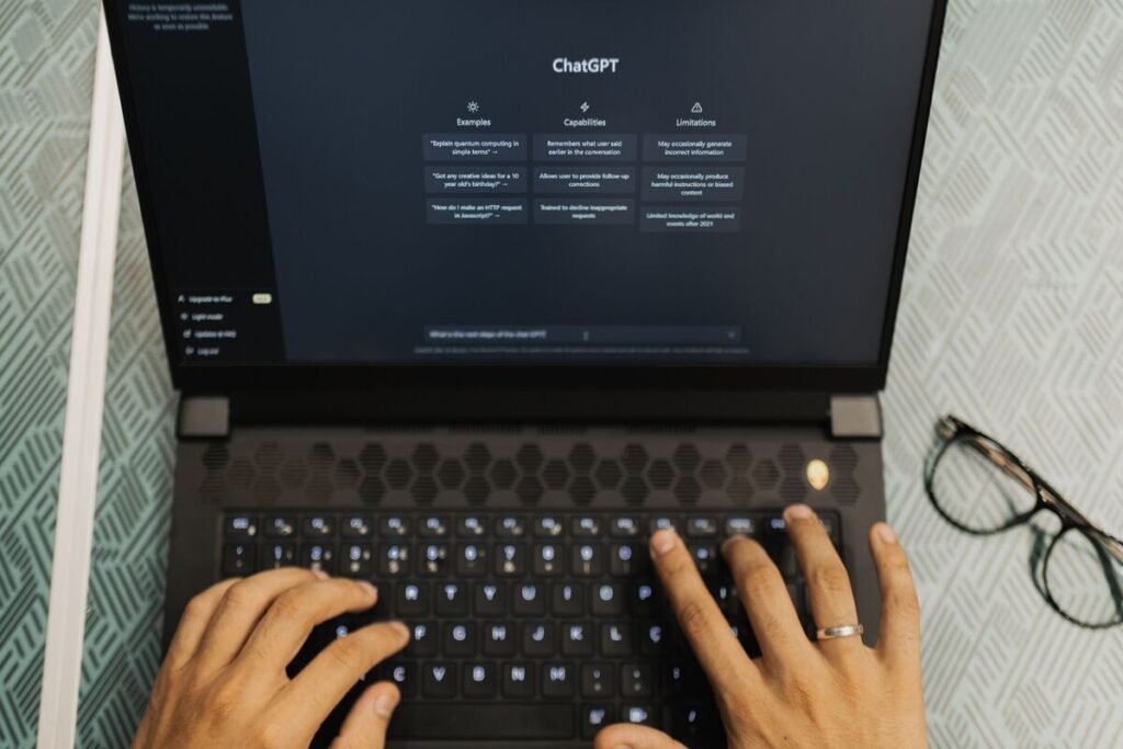 typing on a laptop with ChatGPT on the screen, what is GEO